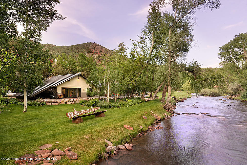 7800 Frying Pan Road Basalt, CO 81621 - Photo 23 of 30 a view of a house with a yard and sitting area