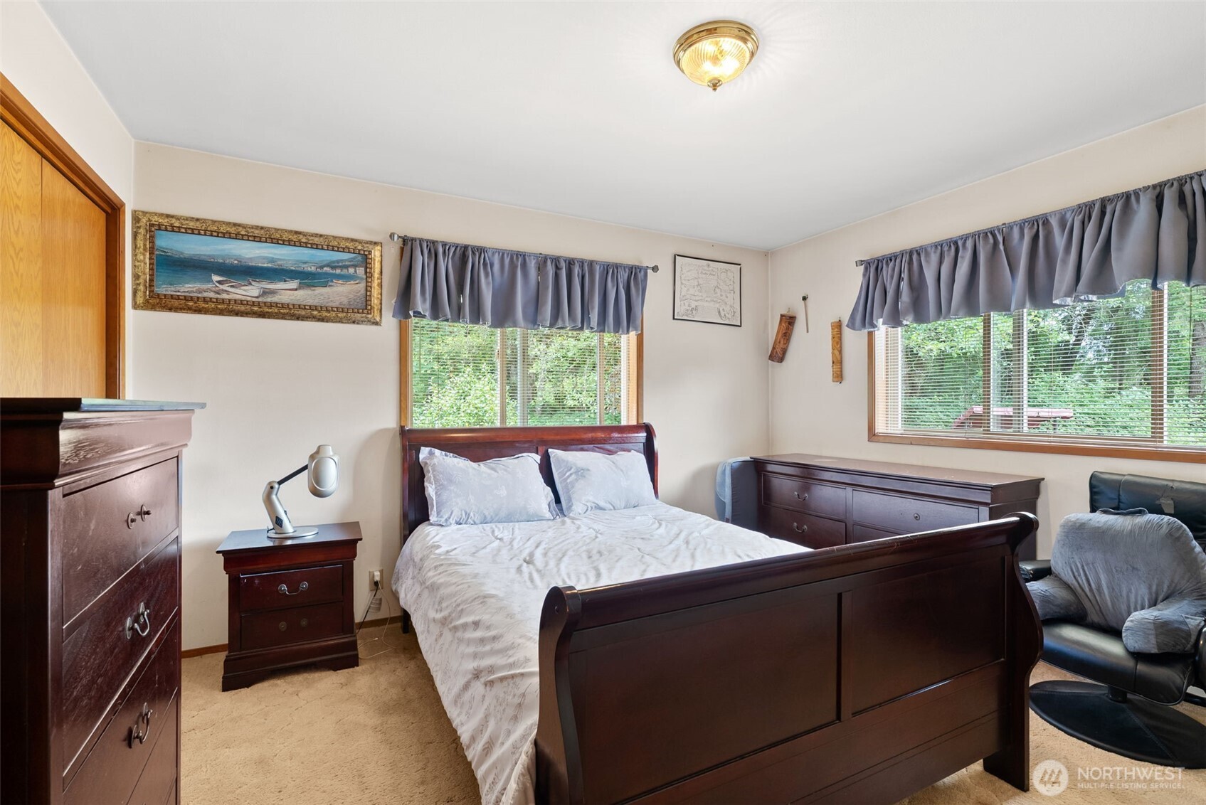 1142 SR 6 Raymond, WA 98577 - Photo 15 of 40 a bedroom with a bed and a window