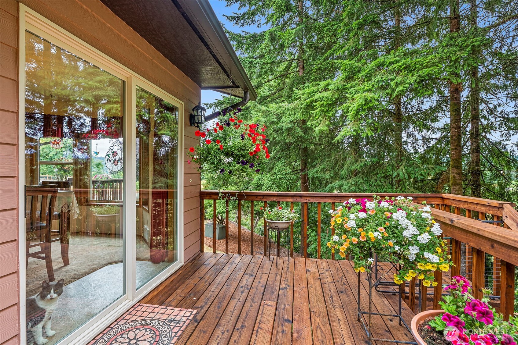 1142 SR 6 Raymond, WA 98577 - Photo 25 of 40 a view of a balcony with flower plants
