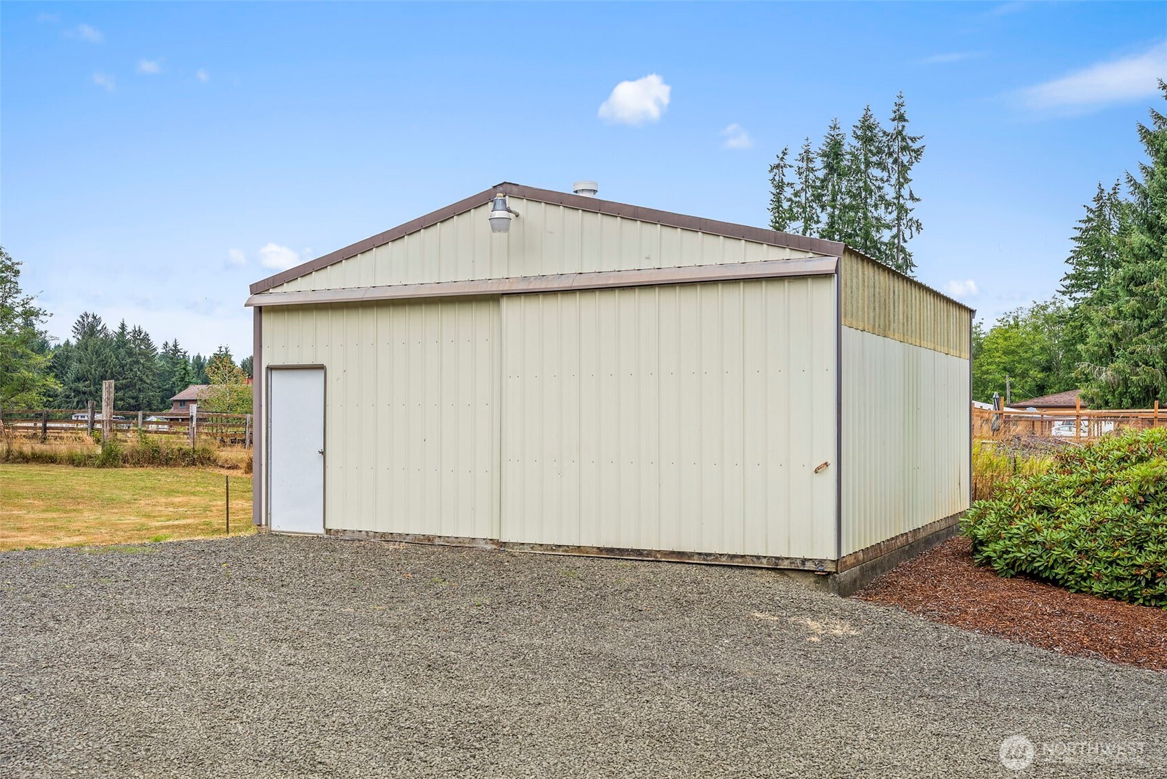 1142 SR 6 Raymond, WA 98577 - Photo 33 of 40 a view of a house with a yard and garage