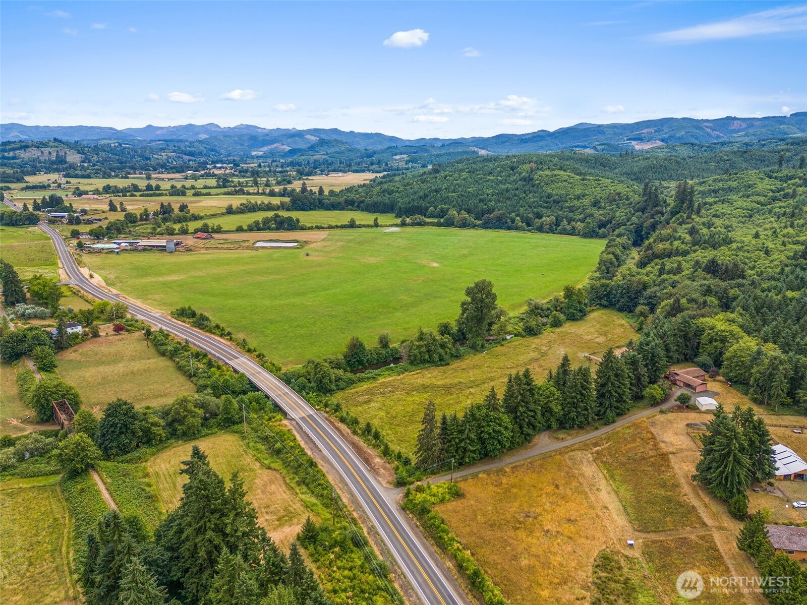 1142 SR 6 Raymond, WA 98577 - Photo 5 of 40 a view of a city from a pool