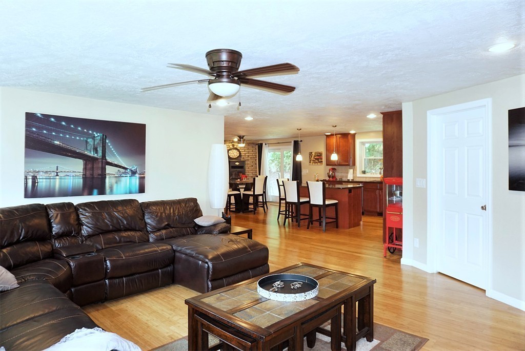 92 Ellendale Circle Springfield, MA 01128 - Photo 6 of 25 a living room with furniture kitchen view and a large window