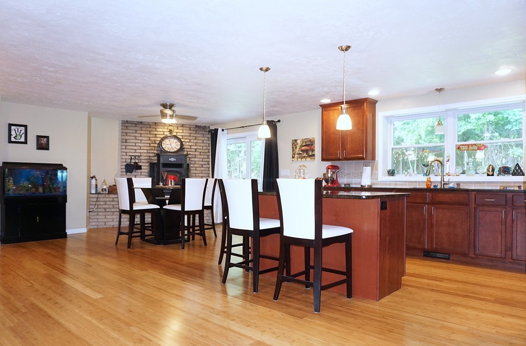 92 Ellendale Circle Springfield, MA 01128 - Photo 7 of 25 a view of a dining room with furniture window and wooden floor