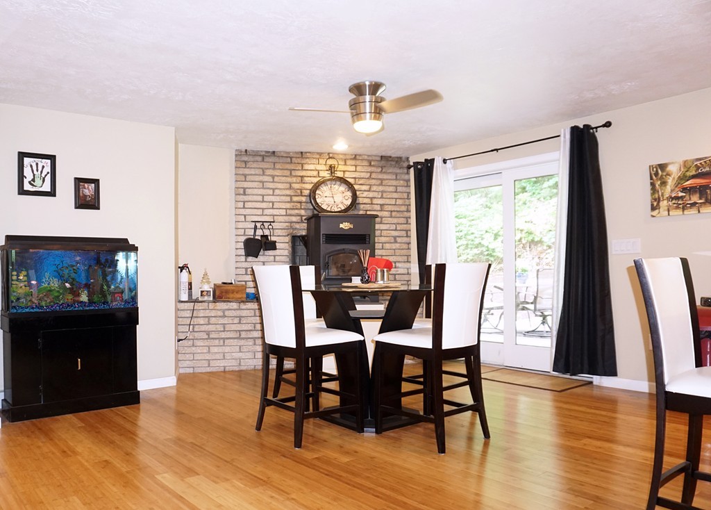 92 Ellendale Circle Springfield, MA 01128 - Photo 9 of 25 a view of a dining room with furniture window and wooden floor