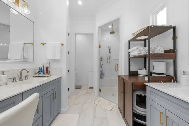 a kitchen with a sink cabinets and a refrigerator