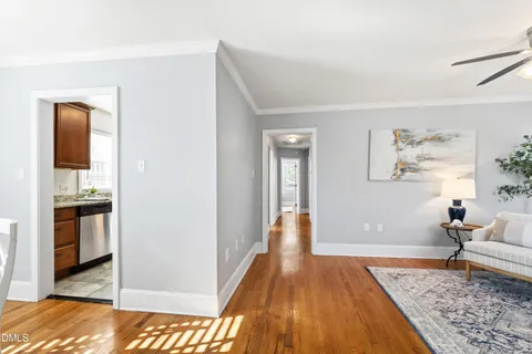 a front view of a house with porch and sitting area