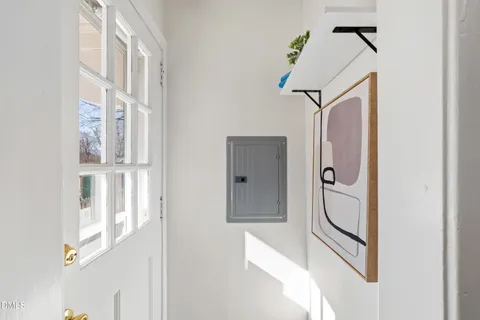 a bathroom with a granite countertop shower and mirror