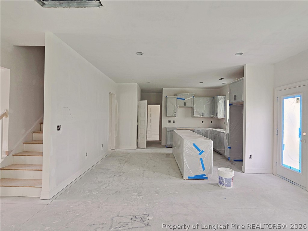 2650 Norrington Road Lillington, NC 27546 - Photo 7 of 24 a view of a kitchen with refrigerator and a sink