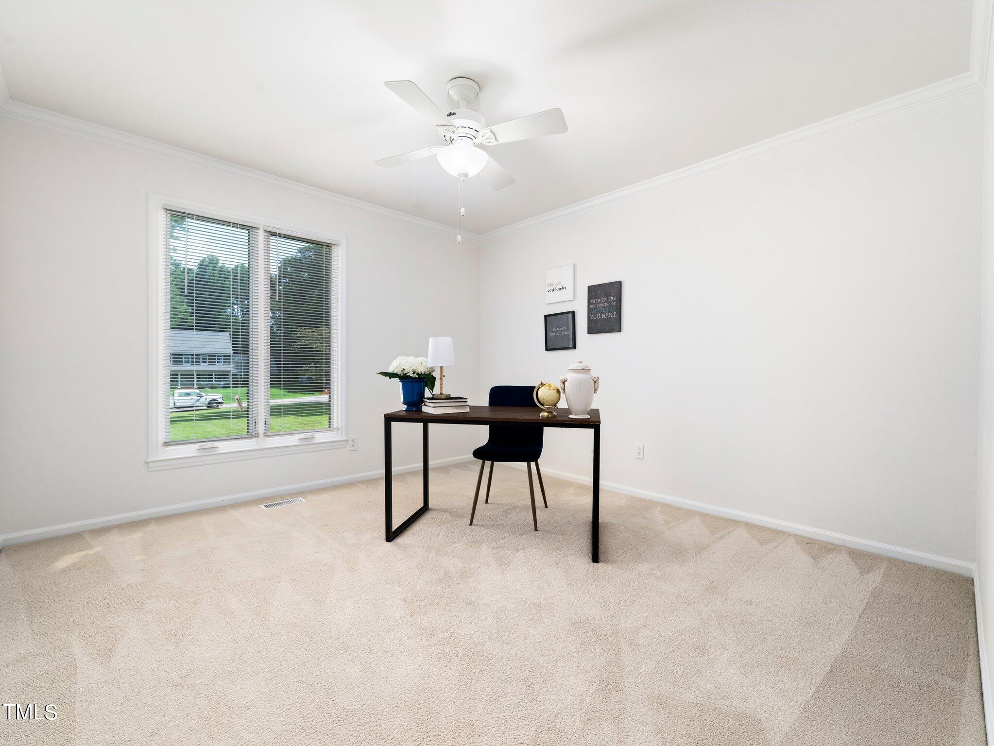 512 Brittany Bay West Raleigh, NC 27614 - Photo 17 of 27 a workspace with furniture and a window