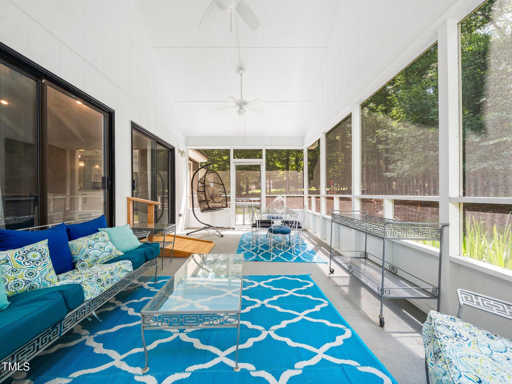 512 Brittany Bay West Raleigh, NC 27614 - Photo 20 of 27 a living room with furniture and a large window
