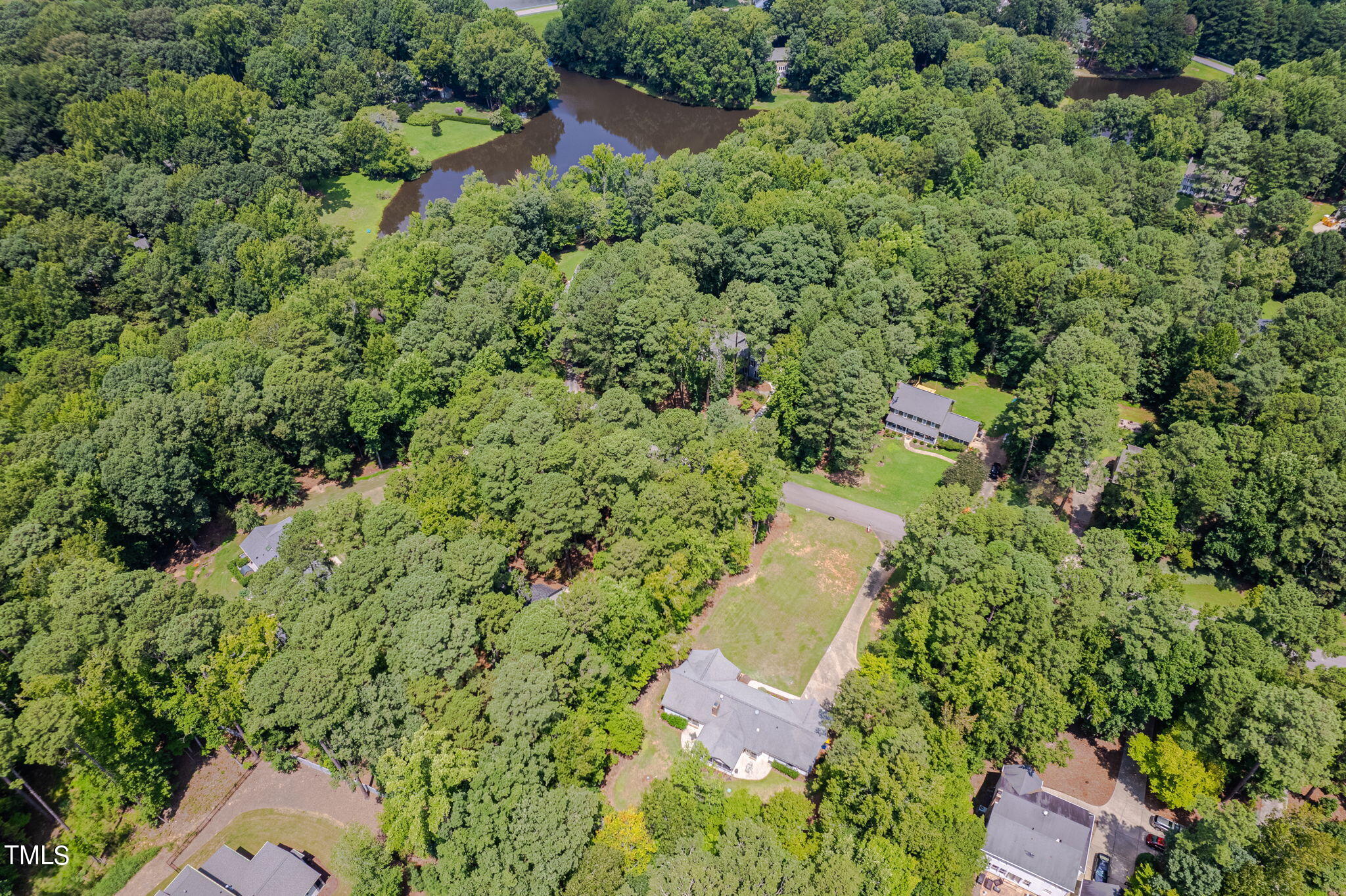 512 Brittany Bay West Raleigh, NC 27614 - Photo 25 of 27 an aerial view of residential house with outdoor space and trees all around