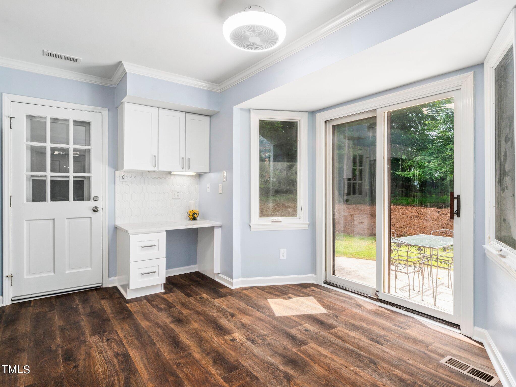 512 Brittany Bay West Raleigh, NC 27614 - Photo 5 of 27 a view of a bedroom with furniture and windows