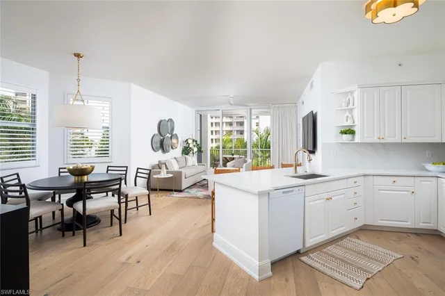 a very nice looking living room with a large window