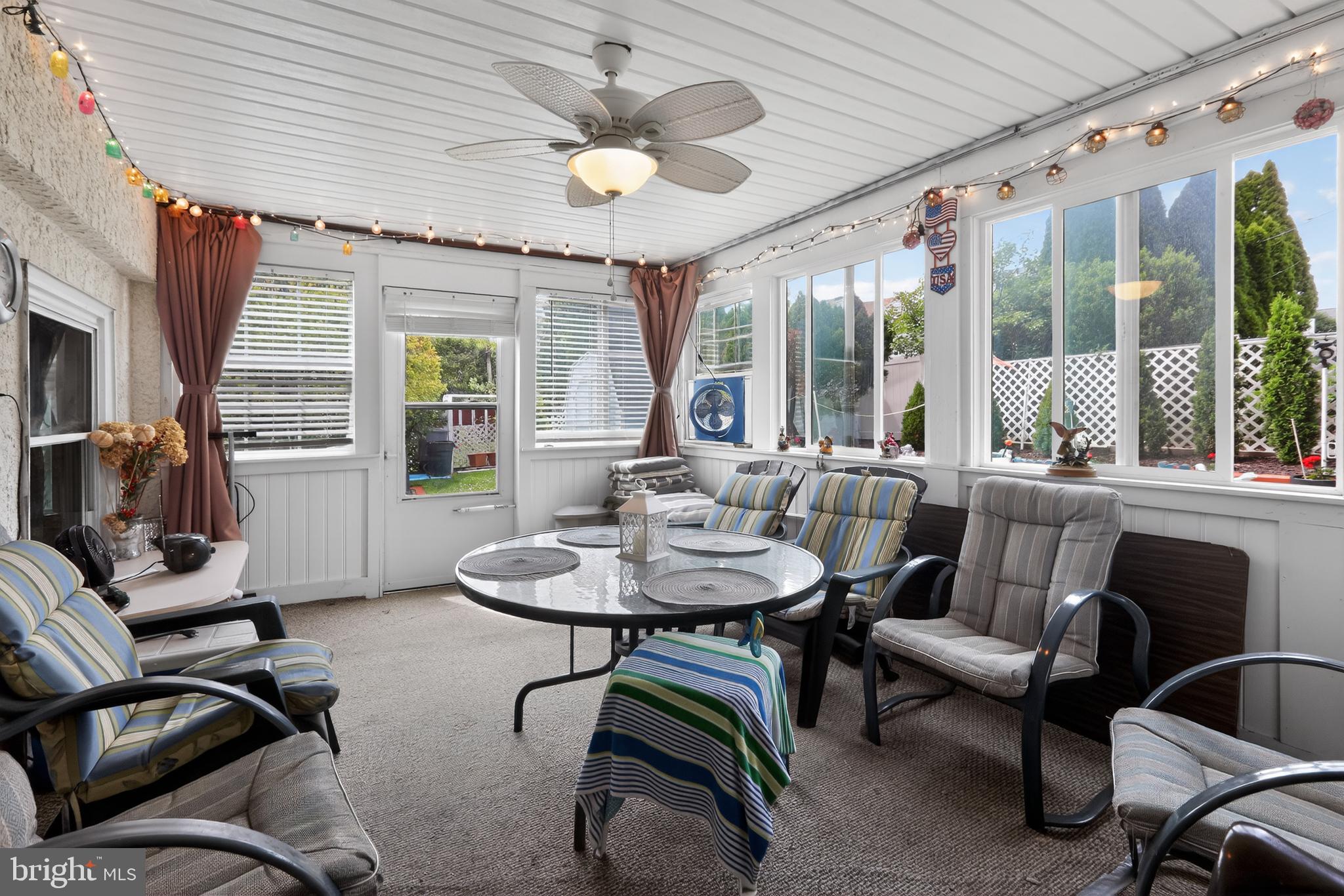 1424 Burmont Road Havertown, PA 19083 - Photo 17 of 37 a view of a livingroom with furniture and a large window