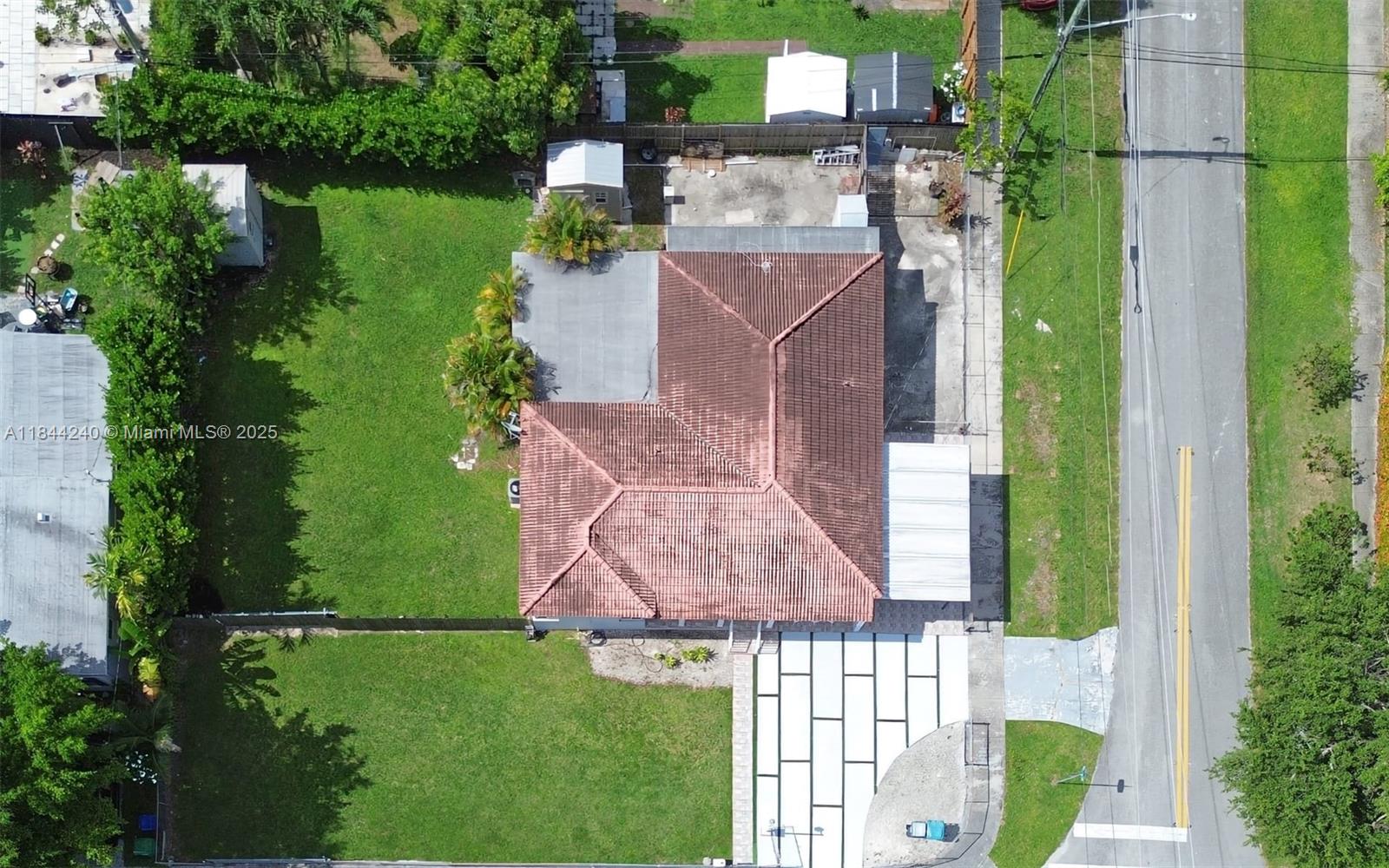 6290 Southwest 37th Street Miami, FL 33155 - Photo 3 of 34 an aerial view of a house having yard