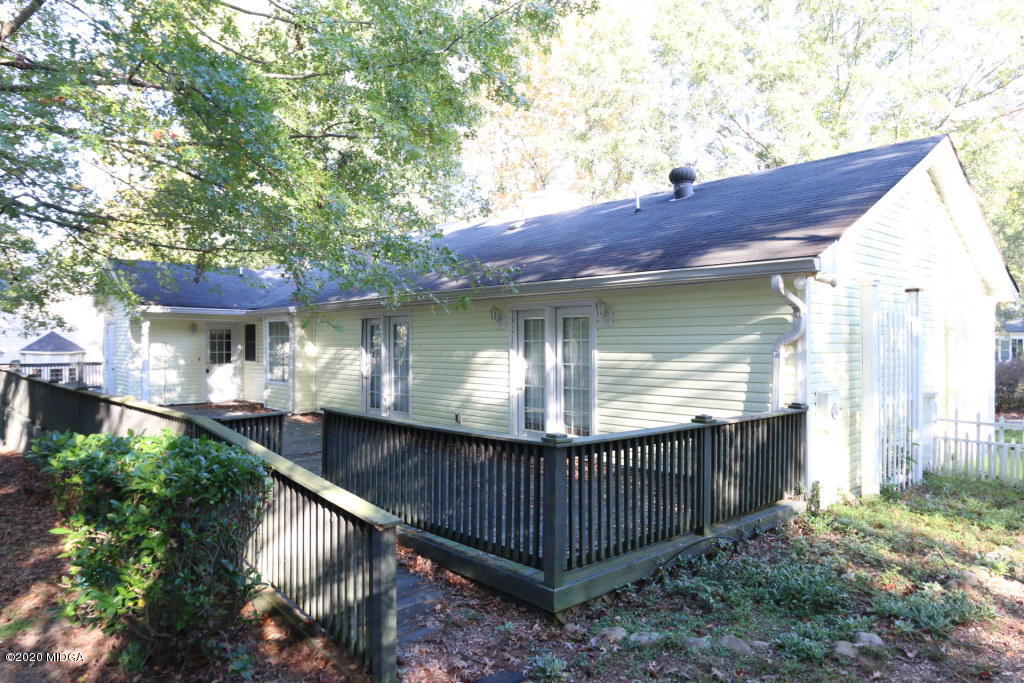 5981 Huddersfield Road Macon, GA 31210 - Photo 3 of 17 a view of a house with a yard