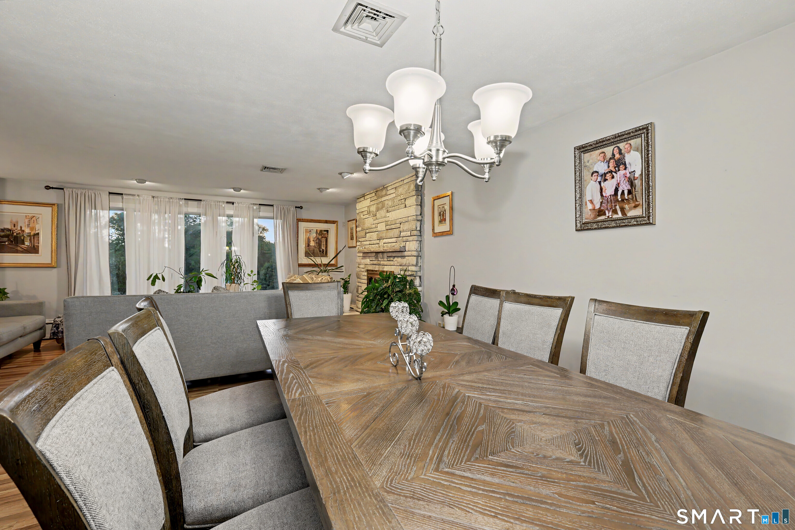 44 Haverhill Road Trumbull, CT 06611 - Photo 10 of 32 a living room with furniture chandelier