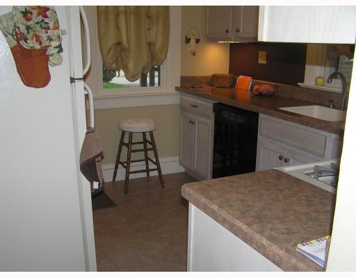 163 Clay Street Rochester, PA 15074 - Photo 8 of 13 Kitchen. All appliances come with this kitchen plus a pantry for additional storage.