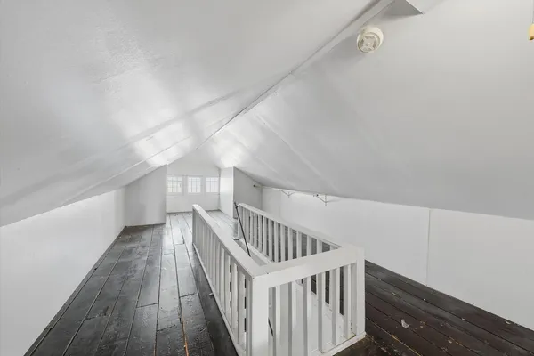 a view of entryway with wooden floor