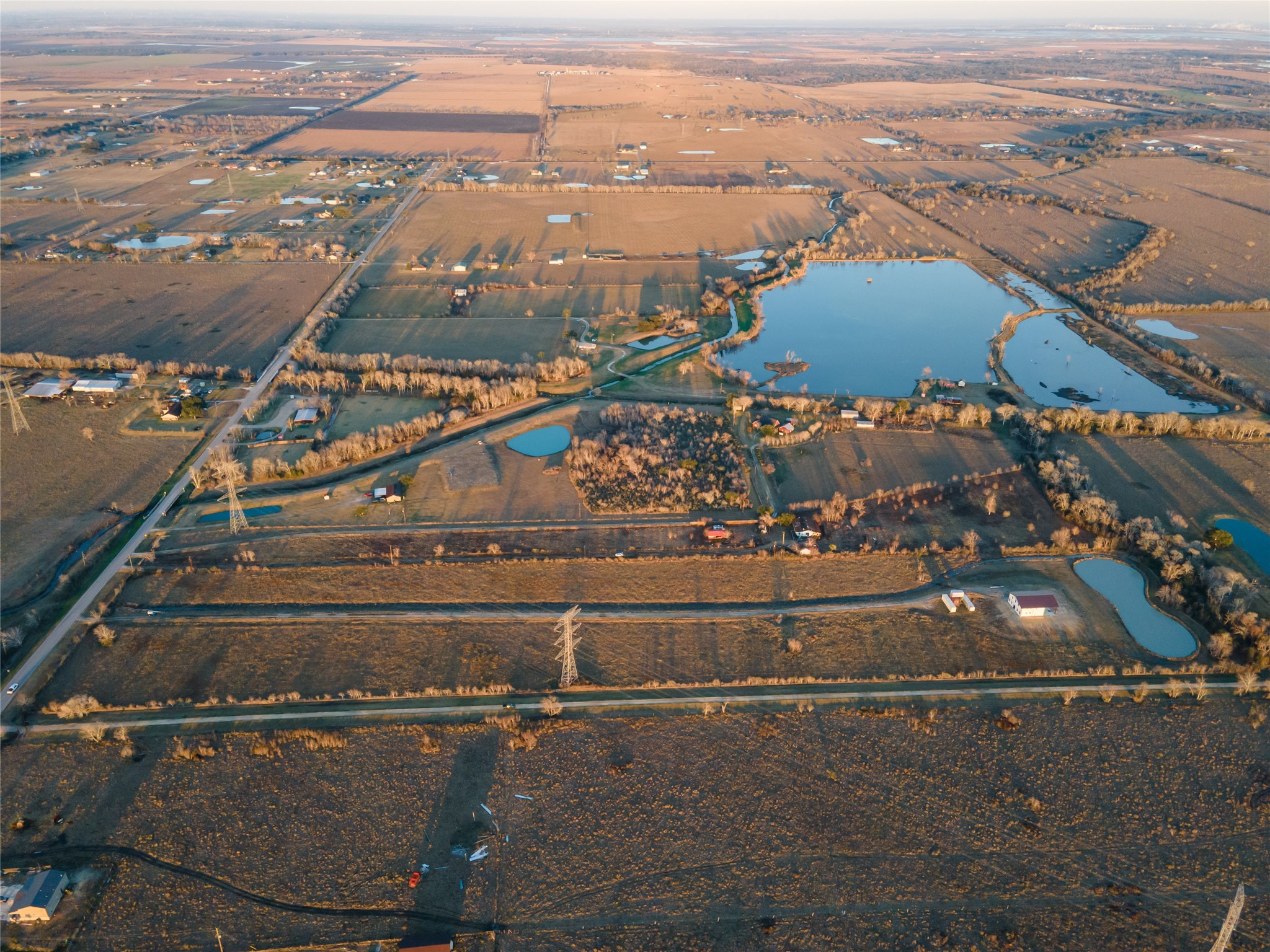 4820 County Road 45 Angleton, TX 77515 - Photo 12 of 14 an aerial view of residential houses with outdoor space