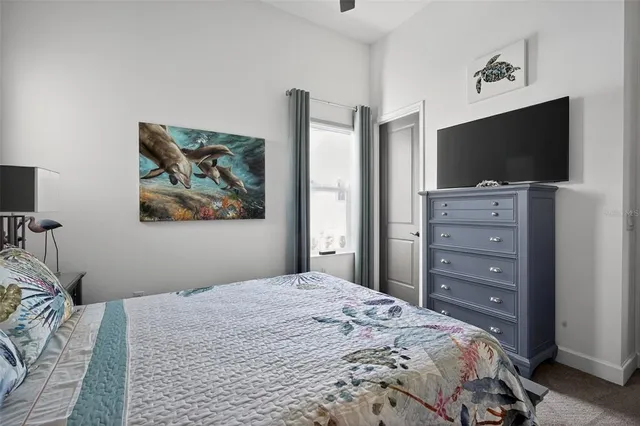 a room with a sink and a stove top oven