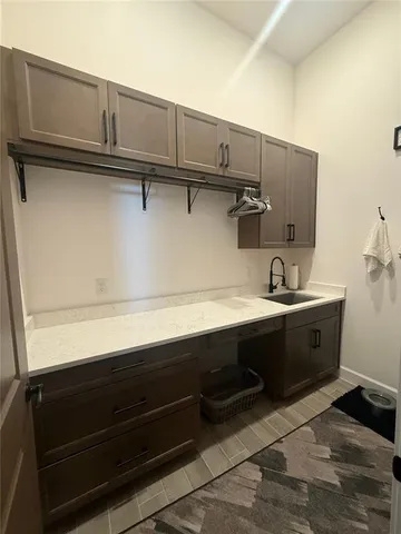 a view of a swimming pool with a lounge chairs