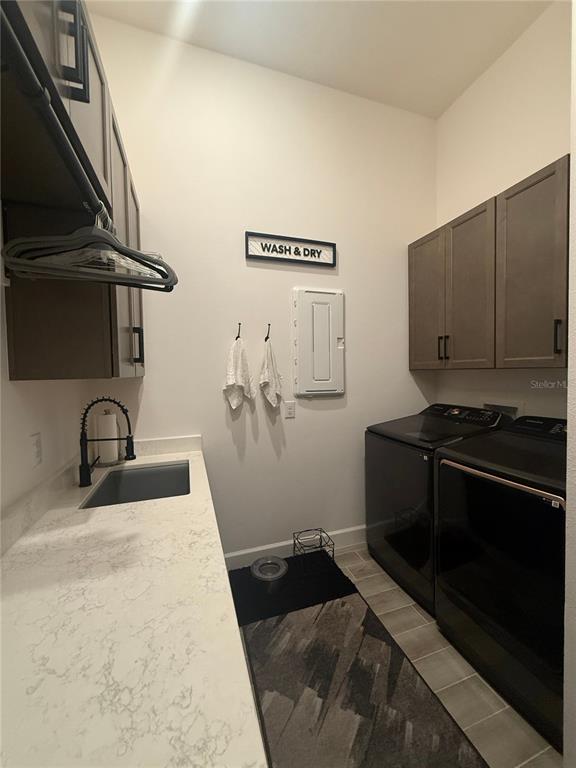 1088 Signet Drive Apollo Beach, FL 33572 - Photo 34 of 49 a room with a sink and a stove top oven