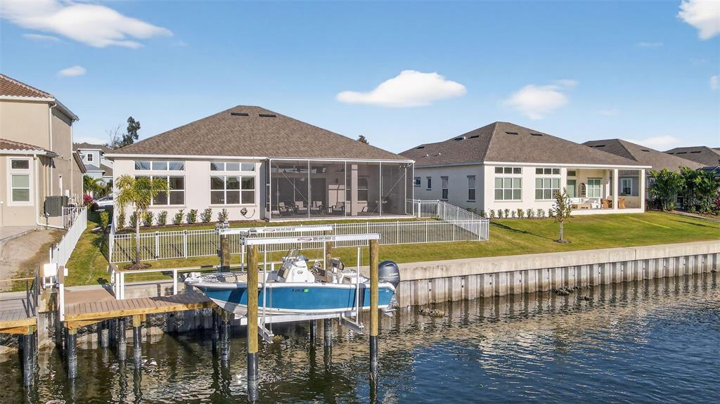 1088 Signet Drive Apollo Beach, FL 33572 - Photo 35 of 49 a view of a house with a swimming pool