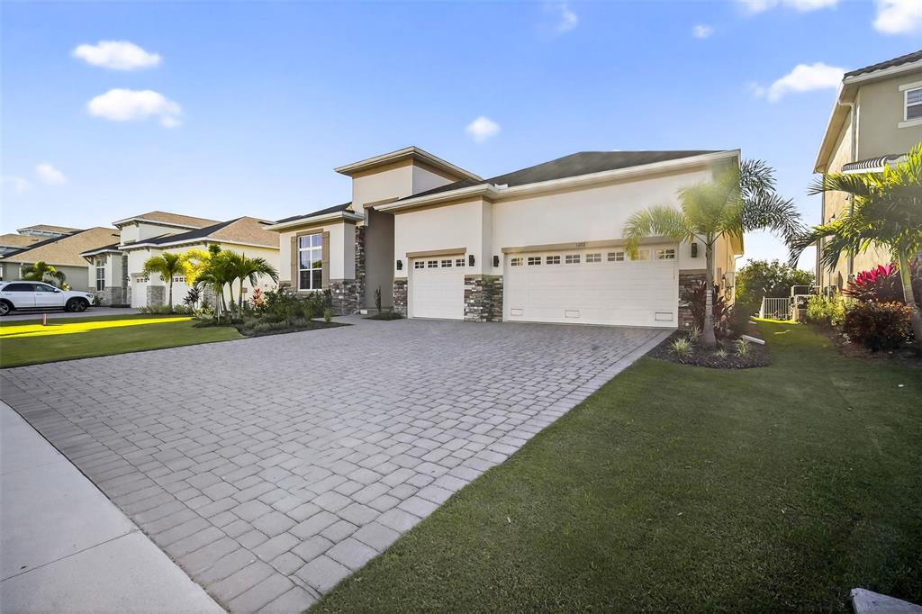1088 Signet Drive Apollo Beach, FL 33572 - Photo 4 of 49 a view of a house with a yard