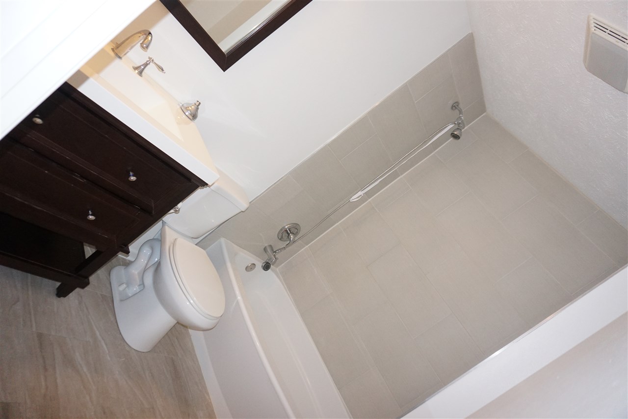 403 Pembroke Road Southwest Poplar Grove, IL 61065 - Photo 13 of 19 a bathroom with a shower and vanity