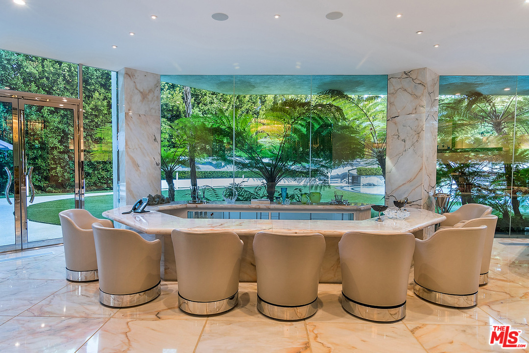 1000 Elden Way Beverly Hills, CA 90210 - Photo 11 of 53 a living room with large window