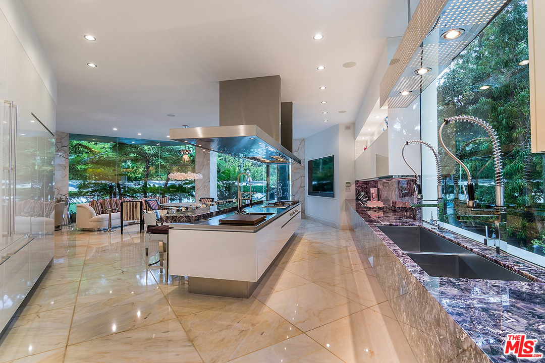 1000 Elden Way Beverly Hills, CA 90210 - Photo 15 of 53 a very nice looking room with a large window