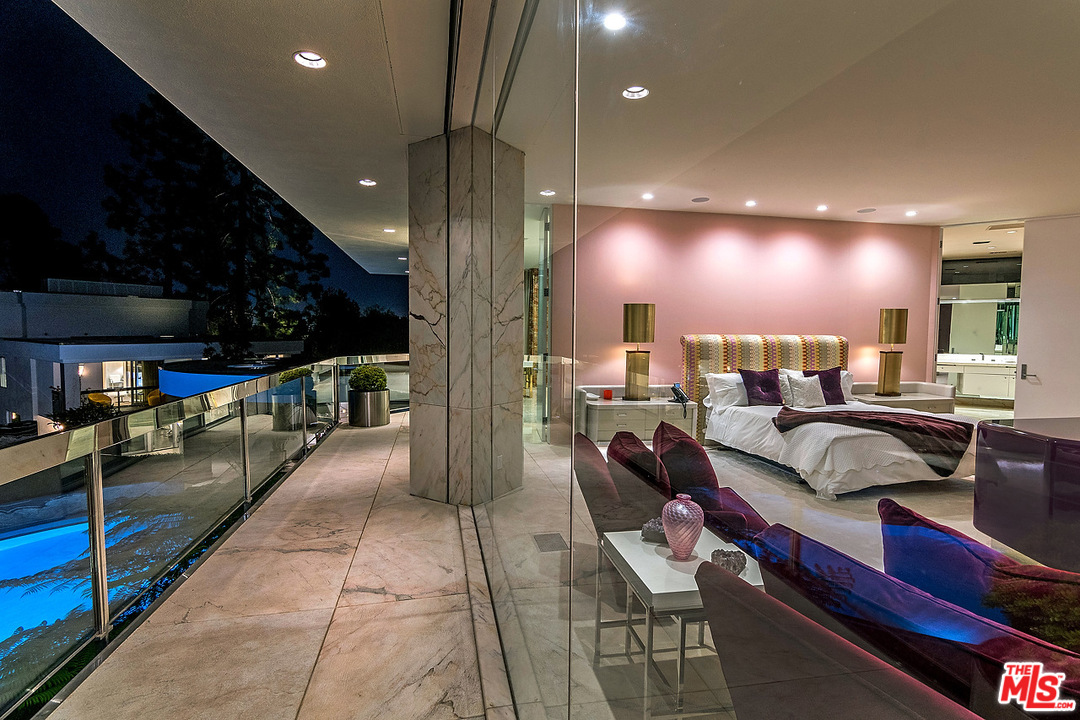 1000 Elden Way Beverly Hills, CA 90210 - Photo 19 of 53 a living room with furniture and a flat screen tv