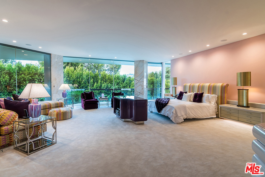 1000 Elden Way Beverly Hills, CA 90210 - Photo 20 of 53 a bedroom with furniture and a large window