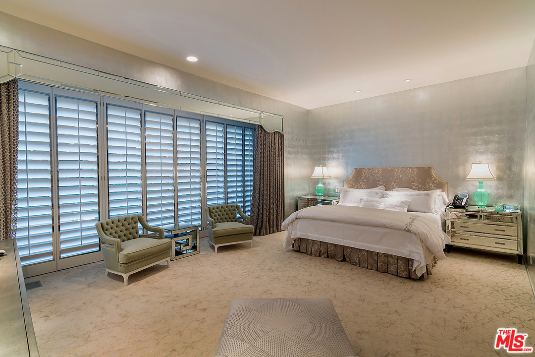 1000 Elden Way Beverly Hills, CA 90210 - Photo 26 of 53 a spacious bedroom with a bed and a window