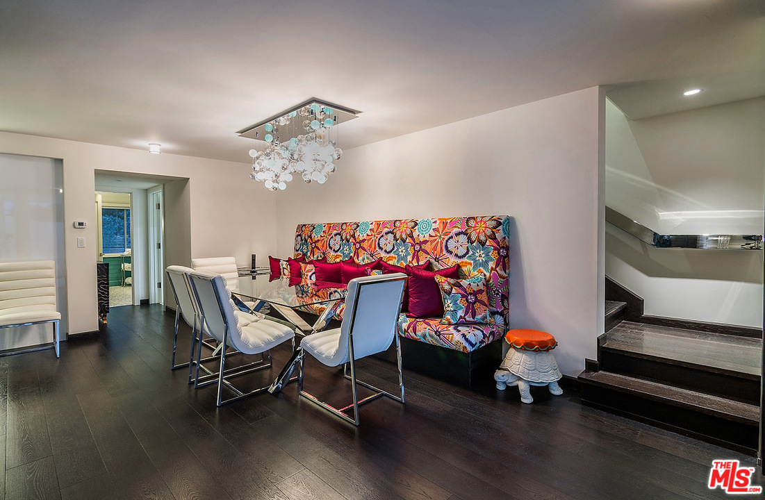 1000 Elden Way Beverly Hills, CA 90210 - Photo 42 of 53 a view of a dining room with furniture and wooden floor