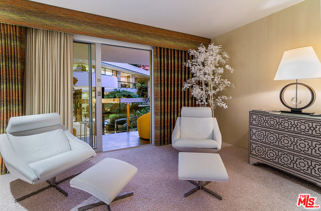 1000 Elden Way Beverly Hills, CA 90210 - Photo 44 of 53 a living room with furniture