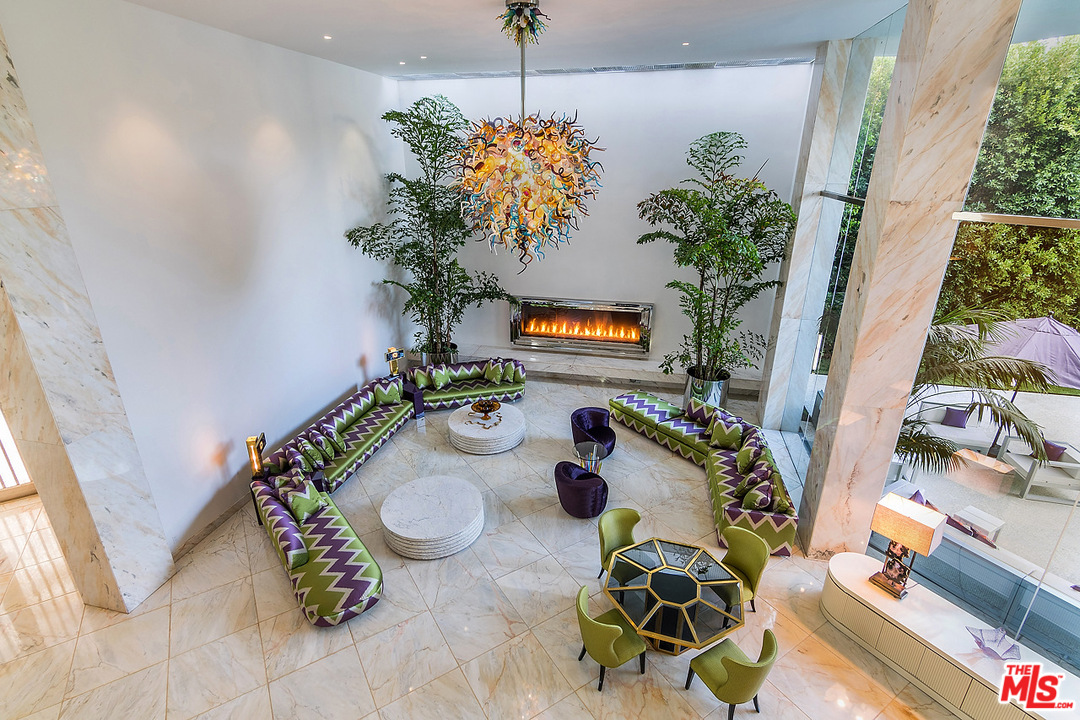 1000 Elden Way Beverly Hills, CA 90210 - Photo 8 of 53 a vase of flowers sitting on a table