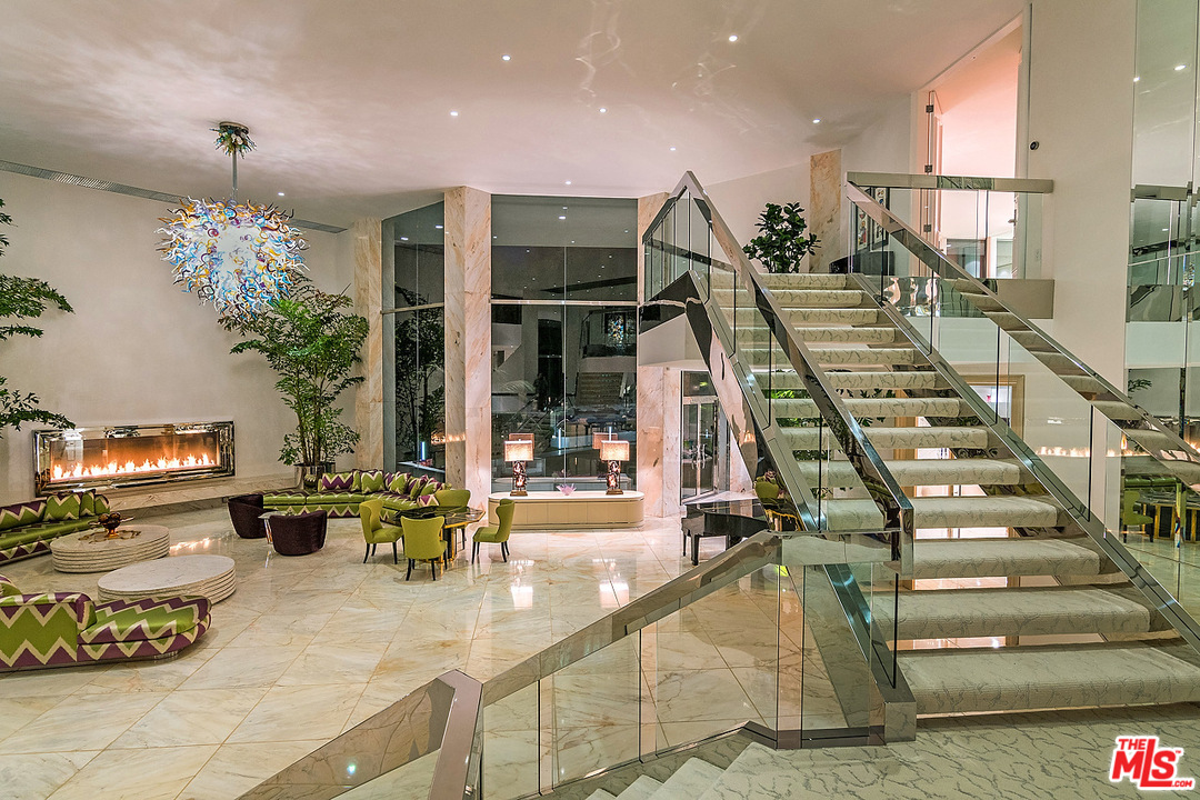 1000 Elden Way Beverly Hills, CA 90210 - Photo 9 of 53 a view of a living room and balcony