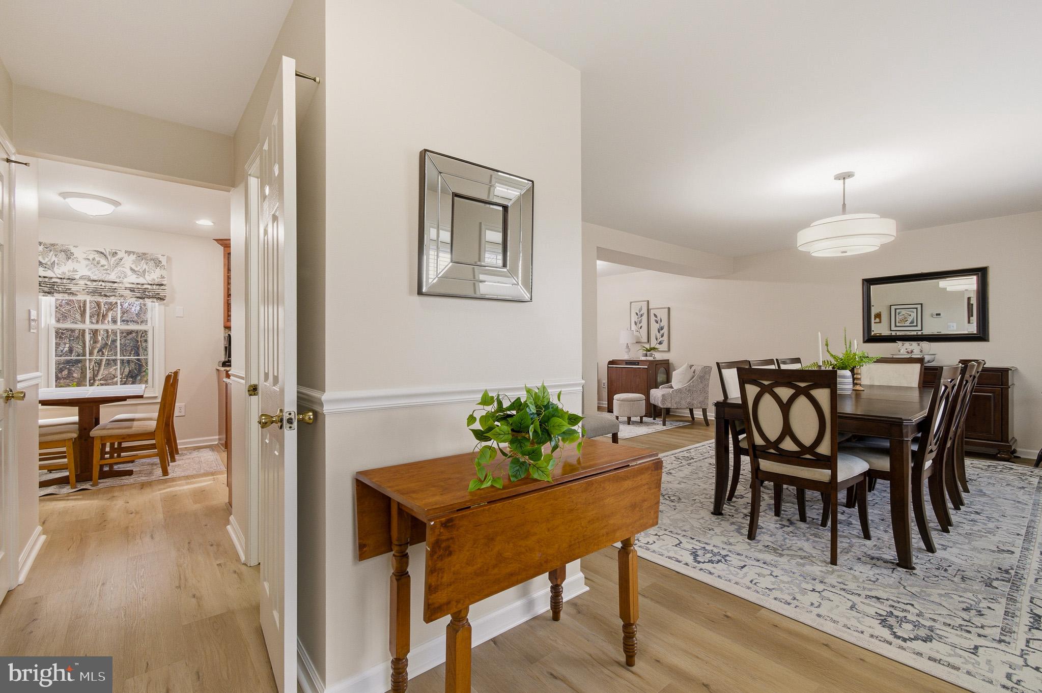 4705 Ilkley Moor Lane Ellicott City, MD 21043 - Photo 3 of 69 a view of a dining room with furniture