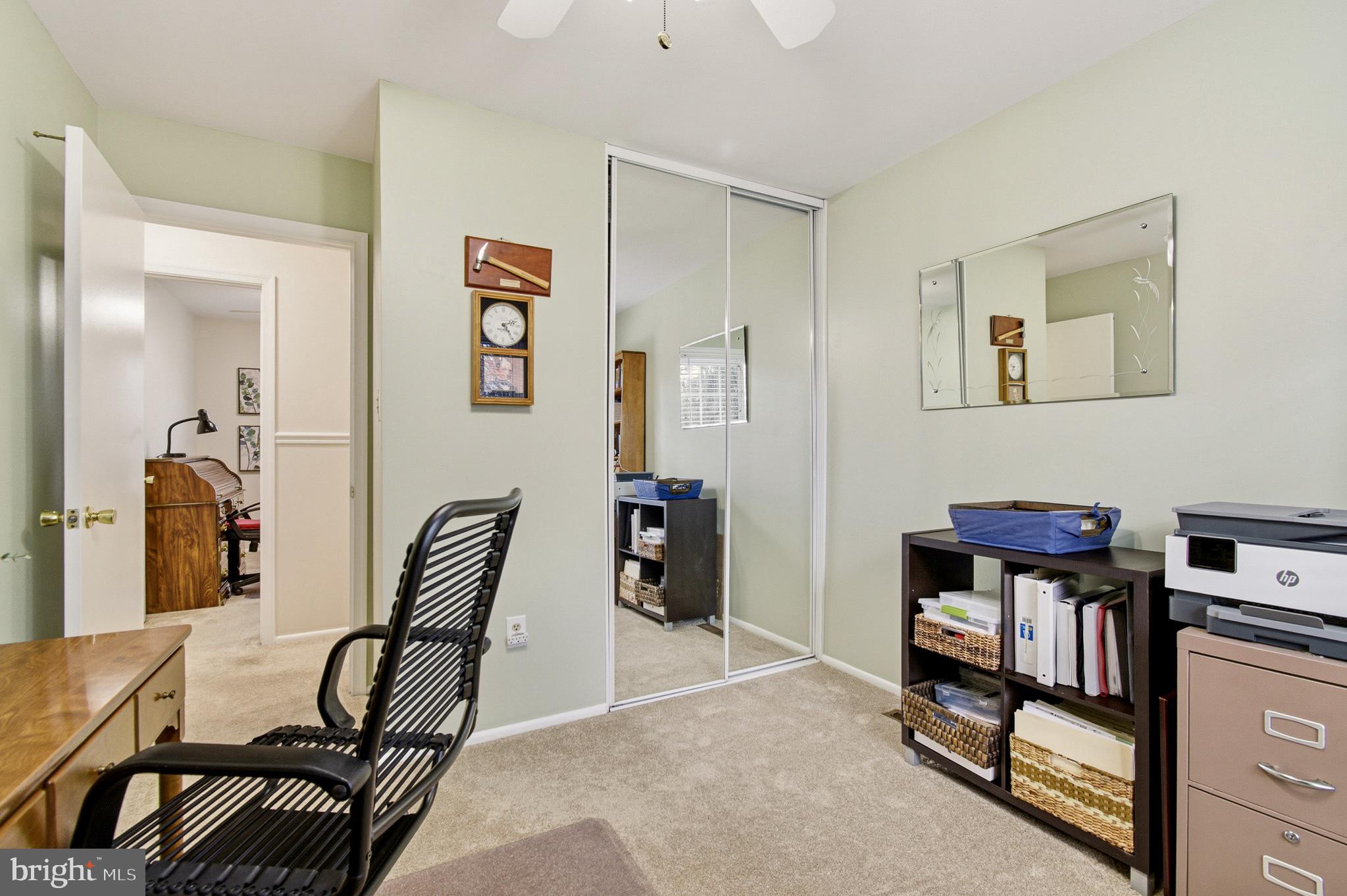 4705 Ilkley Moor Lane Ellicott City, MD 21043 - Photo 35 of 69 a view of a workspace with furniture and closet