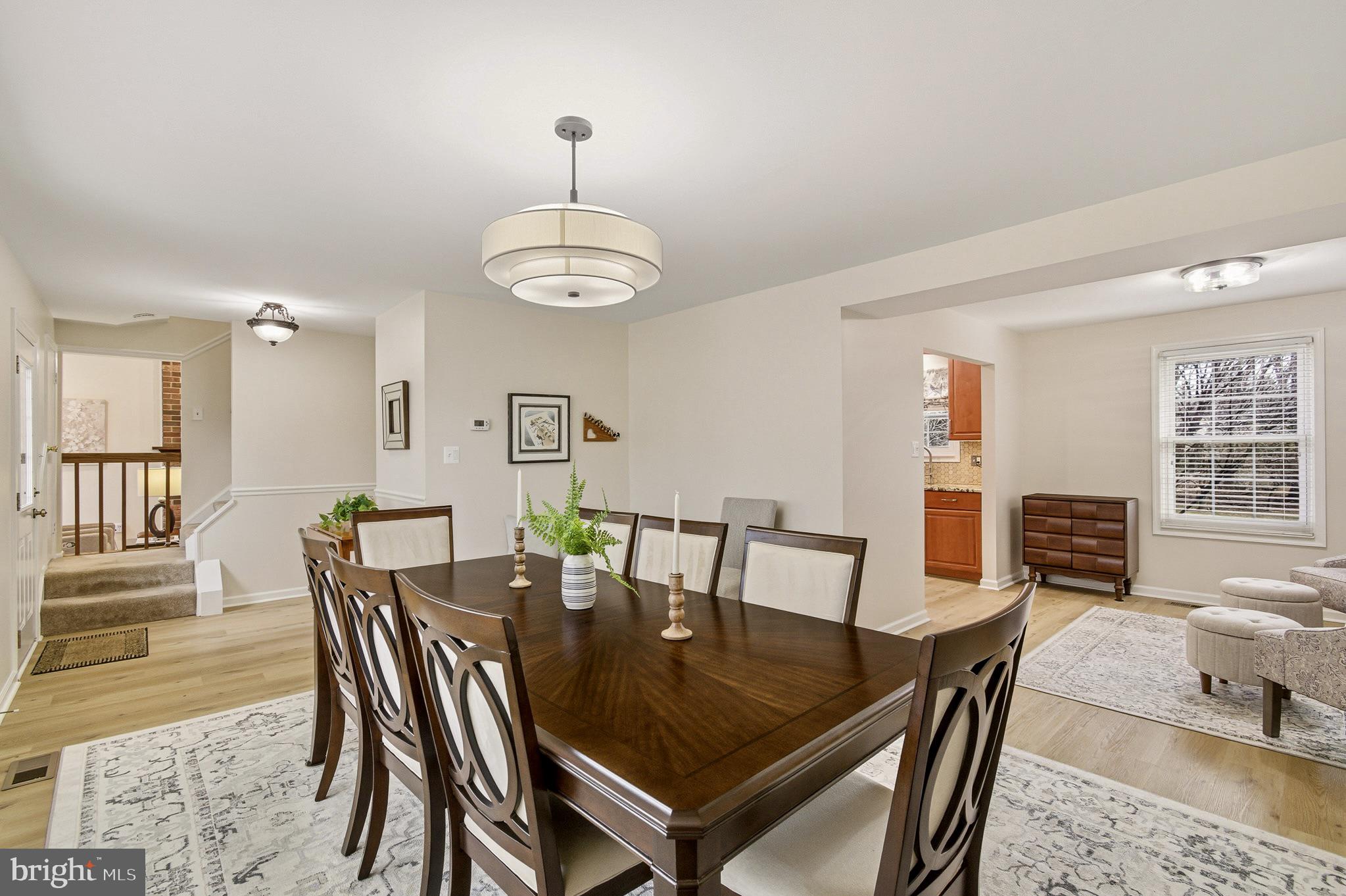 4705 Ilkley Moor Lane Ellicott City, MD 21043 - Photo 4 of 69 a view of a dining room with furniture