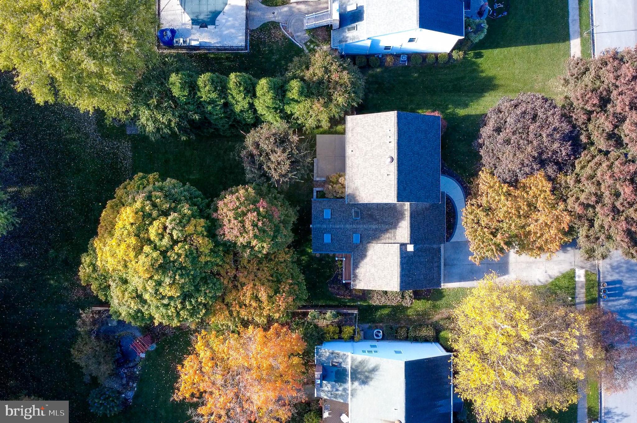 4705 Ilkley Moor Lane Ellicott City, MD 21043 - Photo 65 of 69 an aerial view of a house with a yard and garden