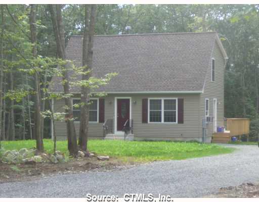 51 Cross Street Killingly, CT 06239 - Photo 1 of 1 a front view of a house with garden