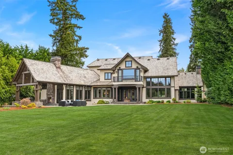 a view of a lake with a yard