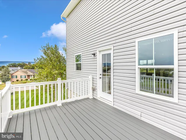 a view of a swimming pool with an ocean view