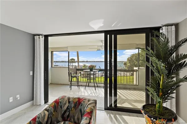 a bedroom with bed and window