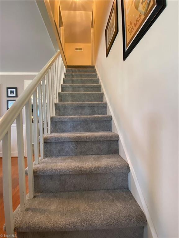 206 Lonesome Road Madison, NC 27025 - Photo 24 of 40 Staircase to 3rd & 4th bedrooms