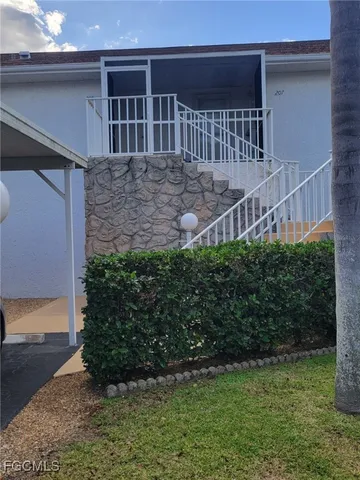 a view of balcony with small garden