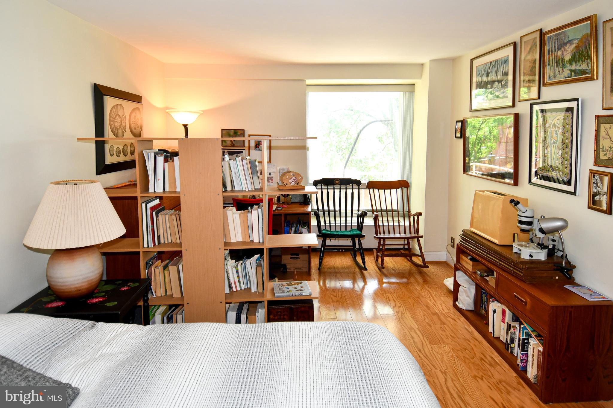 1435 4th Street Southwest, Unit B108 Washington, DC 20024 - Photo 24 of 57 a living room with furniture and wooden floor